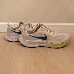 Nike Running Shoes with Blue Swoosh